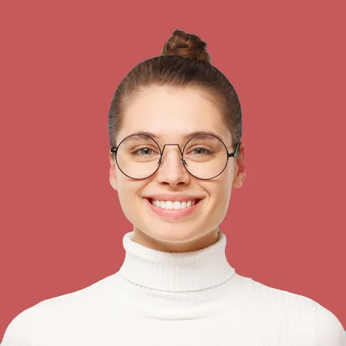 Smiling female IT specialist wearing glasses, representing approachable and professional technology support services